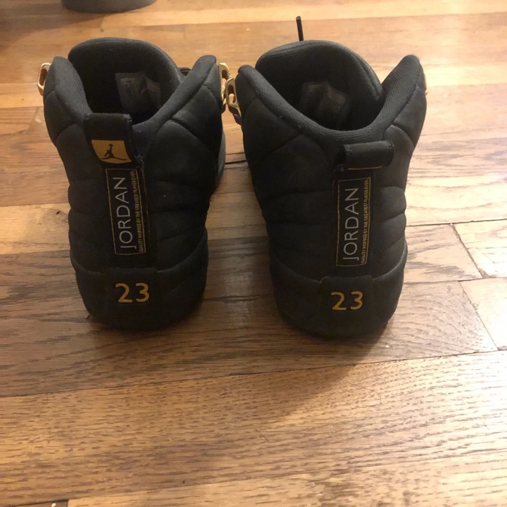 Jordan Men’s Black and Gold High-Top Sneakers